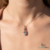 Oval Cut Aquamarine and Diamond Accent Twisted Swirl Pendant