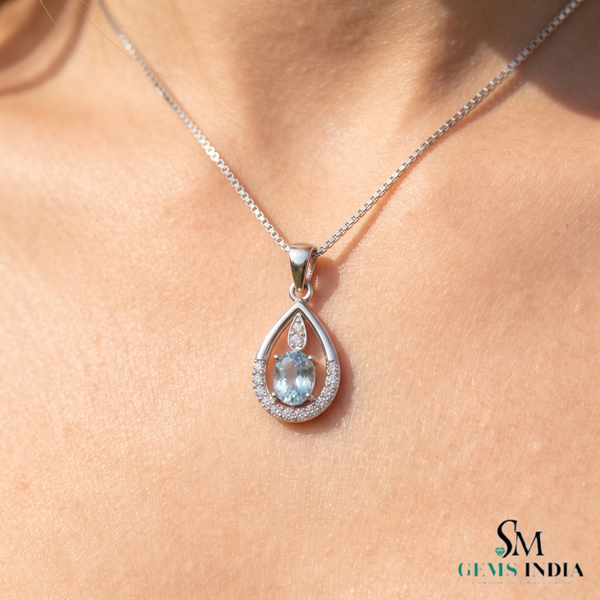 Natural Oval Cut Aquamarine Drop Pendant in a Diamond-Accented Tear Frame