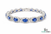 Classic Oval Blue Sapphire Bracelet with Diamond-Style Halo - Statement Jewelry