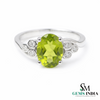 Elegant Oval Green Peridot Ring with Diamond Side Cluster