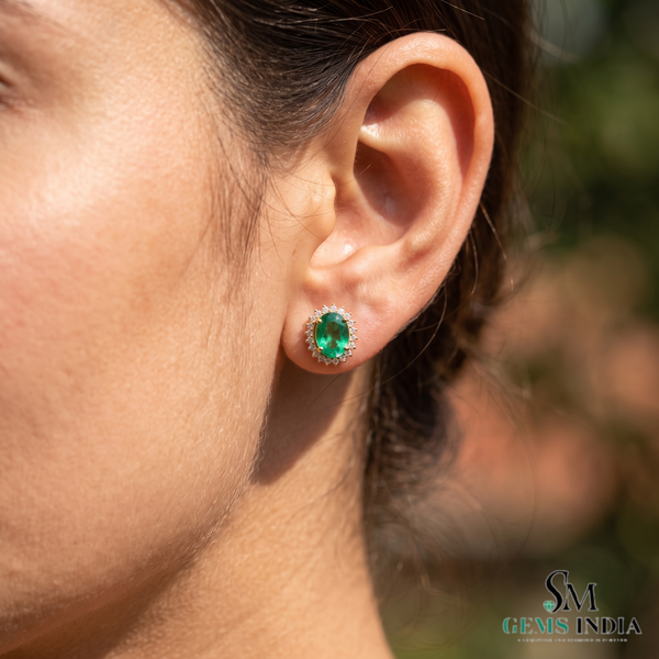Oval shape Natural Emerald Halo Stud Earrings in 14k Gold with Diamond Accents