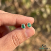 Oval shape Natural Emerald Halo Stud Earrings in 14k Gold with Diamond Accents