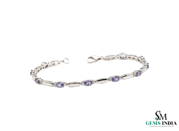 Doppelter Smaragd-Ring in offenem Design aus 14 Karat Gold – Band mit quadratisch und rund geschliffenen grünen Edelsteinen