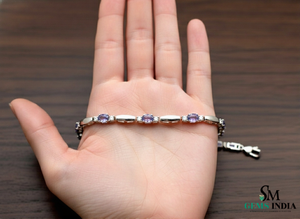 Doppelter Smaragd-Ring in offenem Design aus 14 Karat Gold – Band mit quadratisch und rund geschliffenen grünen Edelsteinen