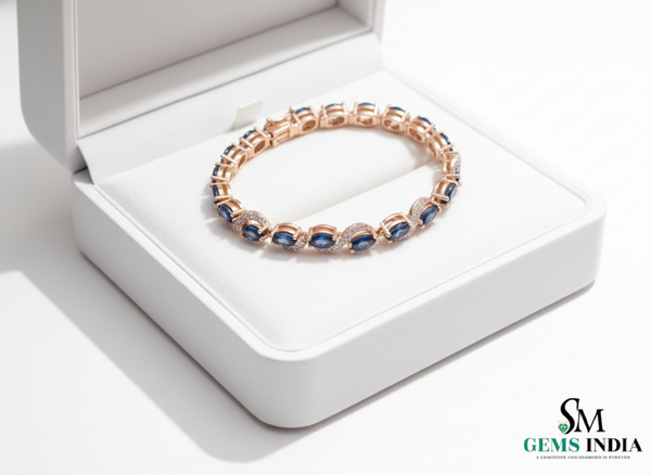Tennisarmband aus Natur-Smaragden im Ovalschliff und Diamanten in Gold | Tennisarmband aus Natur-Smaragden und Diamanten in Gold | Tennisarmband mit großen Smaragden im Ovalschliff