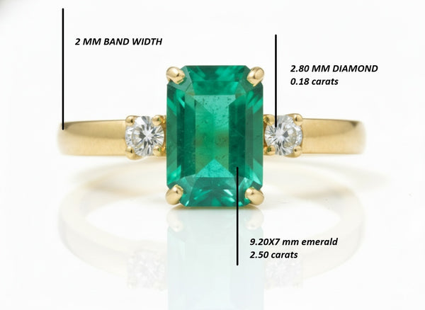 2.50 carat Elegant Emerald Cut Emerald Ring with Diamond Accents and 14k Gold Flat Band