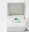 Round Cut Green Emerald Ring with Side Baguette Diamonds – Minimalist Fine Jewelry