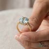 Doppelter Smaragd-Ring in offenem Design aus 14 Karat Gold – Band mit quadratisch und rund geschliffenen grünen Edelsteinen