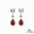 Pear Ruby Drop Earrings with Heart Moissanite & Diamond Accents in 18k Gold