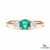 Minimalist Emerald Center Stone Ring with Diamond Accents