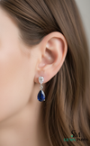 Pear Blue Moissanite Drop Earrings with White Moissanite Accents