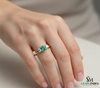Minimalist Emerald Center Stone Ring with Diamond Accents