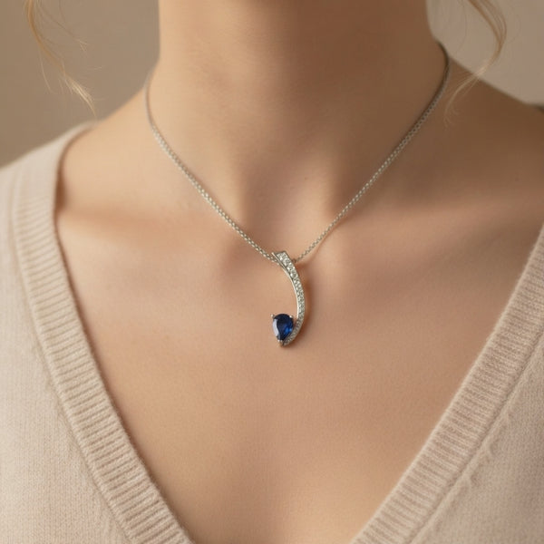 Pear Shaped Natural Blue Tanzanite & Diamond Curved Pendant