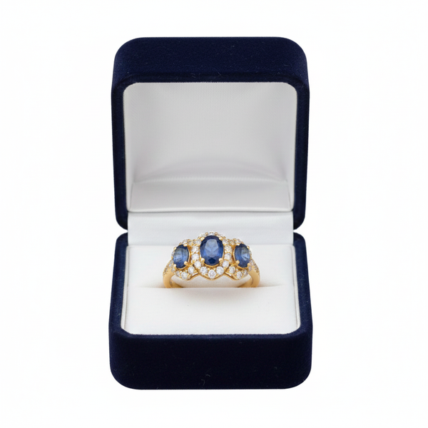 Oval Tanzanite & Diamond Halo Ring in 18k Gold – Luxury Three Stone Design
