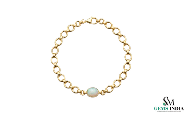 Doppelter Smaragd-Ring in offenem Design aus 14 Karat Gold – Band mit quadratisch und rund geschliffenen grünen Edelsteinen