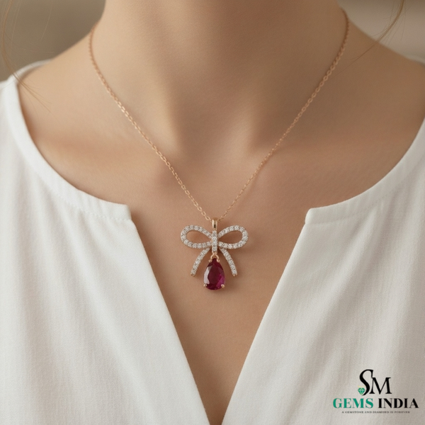 Chic Bow-Inspired Pear Ruby & Diamond Pendant in 14k gold Elegant Fine Jewelry