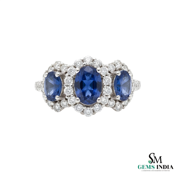 Oval Tanzanite & Diamond Halo Ring in 18k Gold – Luxury Three Stone Design