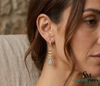 Pear Opal Drop Earrings with Diamond Spiral Design