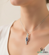 Round Three-Stone Blue Sapphire Diamond Pendant – Elegant Twist Design