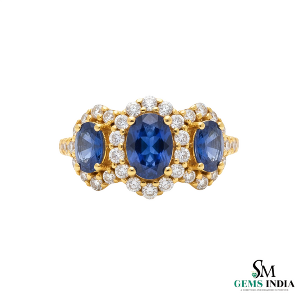 Oval Tanzanite & Diamond Halo Ring in 18k Gold – Luxury Three Stone Design