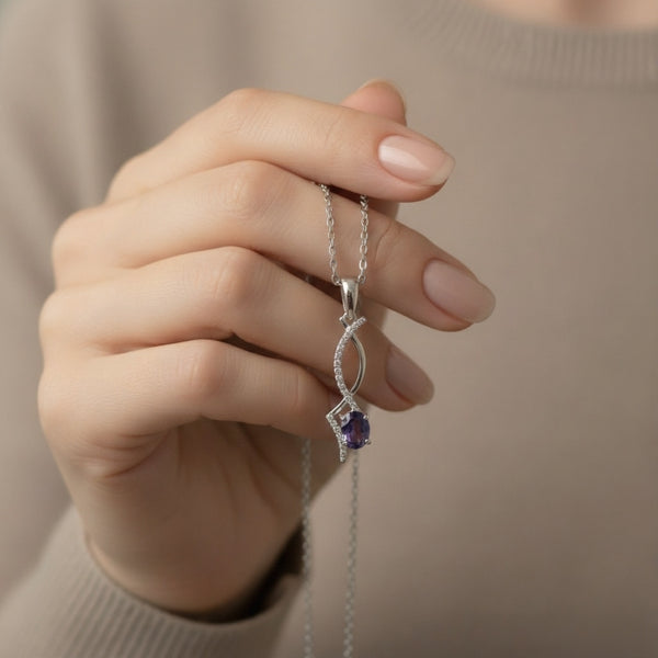 Natural Oval Tanzanite Twisted Diamond Pendant