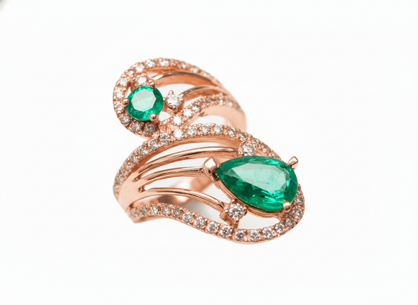 2.10 carat Pear & Round Natural Emerald Spiral Ring in Gold with Diamond Accents