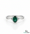 Oval Cut Emerald Ring with Diamond Halo & Split Shank Band