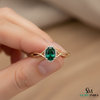Oval Cut Emerald Ring with Diamond Halo & Split Shank Band