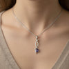 Natural Oval Tanzanite Twisted Diamond Pendant