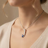 Pear Shaped Natural Blue Tanzanite & Diamond Curved Pendant