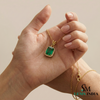 Emerald Cut Green Emerald Halo Pendant with Diamond Accents