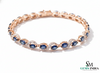 Tennisarmband aus Natur-Smaragden im Ovalschliff und Diamanten in Gold | Tennisarmband aus Natur-Smaragden und Diamanten in Gold | Tennisarmband mit großen Smaragden im Ovalschliff