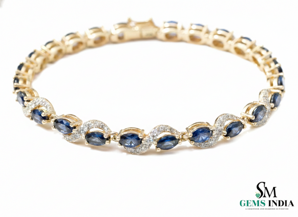 Tennisarmband aus Natur-Smaragden im Ovalschliff und Diamanten in Gold | Tennisarmband aus Natur-Smaragden und Diamanten in Gold | Tennisarmband mit großen Smaragden im Ovalschliff