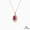 Pear Cut Natural Ruby and Diamond Halo Pendant in 14K gold