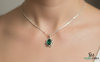 Vintage Style Oval Emerald Gold Pendant – Elegant Floral Frame