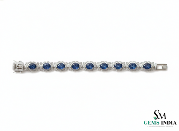 Tennisarmband aus Natur-Smaragden im Ovalschliff und Diamanten in Gold | Tennisarmband aus Natur-Smaragden und Diamanten in Gold | Tennisarmband mit großen Smaragden im Ovalschliff