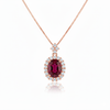 Oval Cut Ruby & Diamond Halo Pendant in 14K Gold