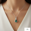 1.30 carat Infinity Teardrop Natural Emerald Pendant with Diamond Accents in 14K gold