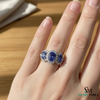 Oval Tanzanite & Diamond Halo Ring in 18k Gold – Luxury Three Stone Design