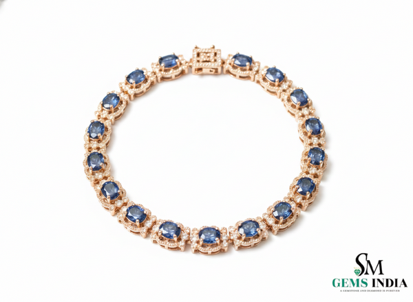 Tennisarmband aus Natur-Smaragden im Ovalschliff und Diamanten in Gold | Tennisarmband aus Natur-Smaragden und Diamanten in Gold | Tennisarmband mit großen Smaragden im Ovalschliff