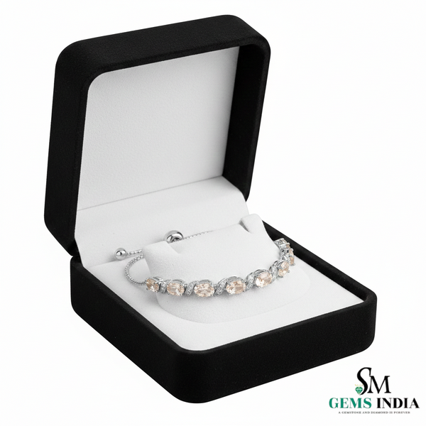 Tennisarmband aus Natur-Smaragden im Ovalschliff und Diamanten in Gold | Tennisarmband aus Natur-Smaragden und Diamanten in Gold | Tennisarmband mit großen Smaragden im Ovalschliff