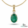 Minimalist Oval Emerald Pendant with Diamond Detail - Green gemstone Jewelry
