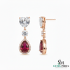 Pear Ruby Drop Earrings with Heart Moissanite & Diamond Accents in 18k Gold