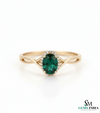Oval Cut Emerald Ring with Diamond Halo & Split Shank Band