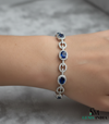 Classic Oval Blue Sapphire Bracelet with Diamond-Style Halo - Statement Jewelry