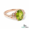 Elegant Oval Green Peridot Ring with Diamond Side Cluster
