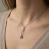 Natural Oval Tanzanite Twisted Diamond Pendant