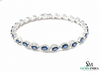 Tennisarmband aus Natur-Smaragden im Ovalschliff und Diamanten in Gold | Tennisarmband aus Natur-Smaragden und Diamanten in Gold | Tennisarmband mit großen Smaragden im Ovalschliff