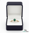 Oval Cut Emerald Ring with Diamond Halo & Split Shank Band