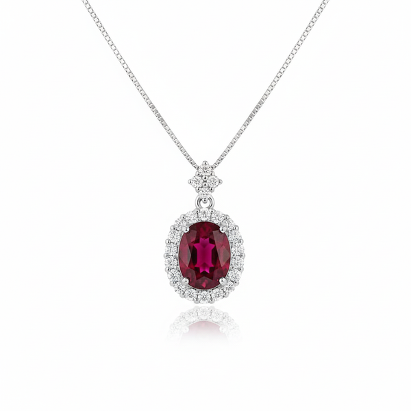 Oval Cut Ruby & Diamond Halo Pendant in 14K Gold